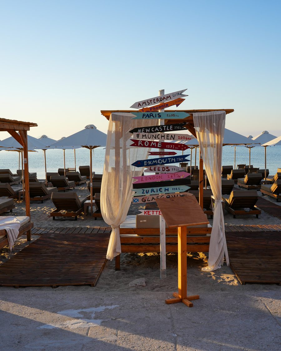 Beach beds and cabanas on the sand at Starlight Beach Bar, Kardamena